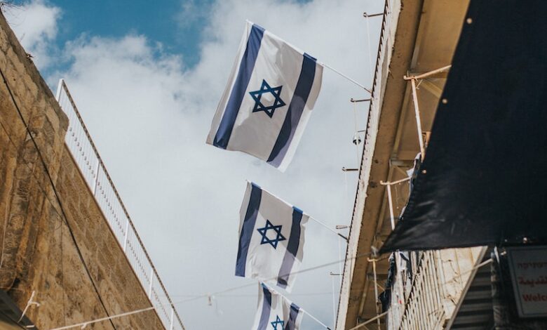 flags hanging on roof during daytime